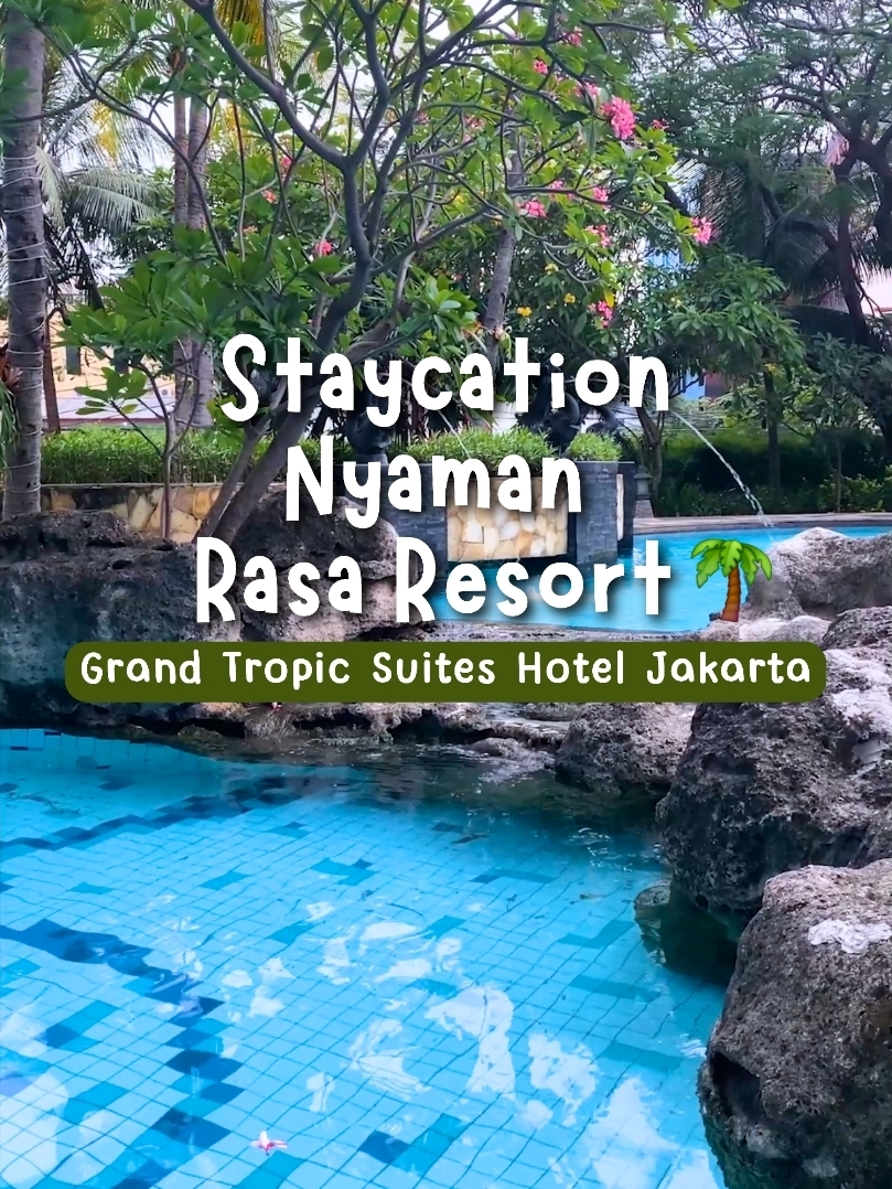 Hotel ala Resort di Jakarta
Staycation di Grand Tropic Suites Hotel Jakarta kali ini benar-benar memberikan pengalaman berbeda, serasa liburan pantai tanpa harus keluar kota. Area kolam renangnya unik dengan pasir dan bebatuan alami, menghadirkan nuansa resort tropis yang bikin betah berlama-lama. Suasana hijau dengan pepohonan kelapa semakin menambah rasa rileks sejak pagi.

Kamarnya luas dan nyaman, dengan kasur empuk yang pas untuk istirahat setelah seharian beraktivitas. Fasilitas kamar mandi juga menjadi nilai plus karena tersedia bathtub besar, cocok untuk relaksasi maksimal.

Bagi yang datang bersama keluarga, Kids Club yang colorful dan ramah anak sangat membantu agar si kecil tetap aktif dan happy selama menginap. Area hotelnya terasa tenang meski berada di Jakarta Barat, sehingga cocok untuk quality time tanpa distraksi.

Secara keseluruhan, Grand Tropic Suites Hotel Jakarta sangat direkomendasikan untuk staycation keluarga, pasangan, maupun siapa pun yang ingin menikmati suasana resort dengan kenyamanan hotel bintang.

#hotelkidsfriendly #hotelkeluarga #staycation #hoteljakarta 