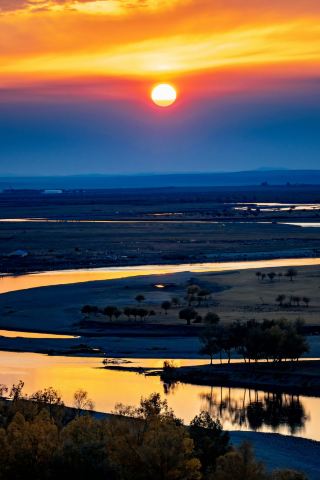 Heishantou sunset hill | a sunset date with the grassland and wetland