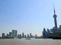Taking a nice day time stroll across The Bund at Shanghai