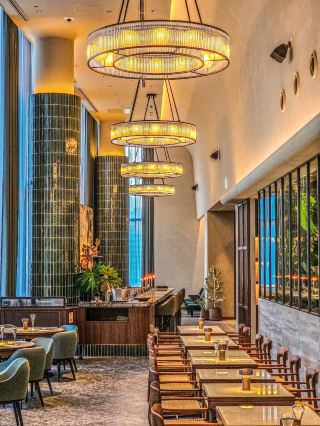 Surrounded by greenery, experience modern French cuisine for adults. 