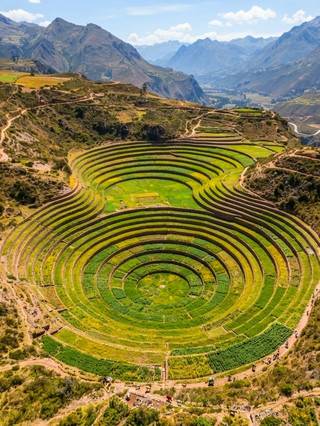 Moray Rice Terraces, Peru – Experience the Wisdom and Spectacularity of the Ancient Incas
Located in Peru's Sacred Valley, the Moray Rice Terraces were known as the outdoor agricultural experimentation grounds of the ancient Inca Empire and are a must-see for exploring Inca civilization. The unique circular terrace structure offers a glimpse into the Incas' ingenious use of geographical and climatic conditions for crop cultivation. History buffs and photography enthusiasts alike will be awestruck by the spectacular scenery!
International Flights & Transportation: Currently, there are no direct flights from Asia. Flights typically require a layover in the US (US visa required), Europe, or Qatar to reach Lima (LIM).
Domestic Transportation: Flights between Lima and Cusco are recommended (flight time approximately 1.5 hours).
Recommended Itinerary: It is suggested to depart from Cusco or other towns in the Sacred Valley (such as Ollantaytambo) and take a day tour or hire a private car, with possible stops along the way to visit attractions such as the Maras Salt Flats. Upon arrival at the More Terraces, the park entrance has basic facilities (such as restrooms/snack shops). The walk to the viewing platforms takes approximately 15 minutes. The circular terraces unfold before your eyes, a truly breathtaking sight.
Must-Visit Spots:
1. Main Viewpoint: Panoramic view overlooking the outermost circular terraces, offering the most complete and spectacular view of the terraces.
2. Inner Ring Path: Slowly walk along designated paths to lower sections of the terraces, where you can take photos at the edge of the terraces and experience a strong sense of space.
3. Information Signage Area: Learn about the structure and purpose of the terraces and how the Incas conducted crop adaptation experiments.
Travel Tips:
1. It is recommended to visit in the morning or evening when the light is softer, resulting in better photos and fewer crowds.
2. Bring your own water and sunscreen, as the UV radiation is very strong; there is not much shade within the area.
3. The paths from the entrance to the various viewing points are unpaved; please wear hiking shoes and light gear.
4. Please proceed with caution in high-altitude areas, walking slowly. If you experience altitude sickness, rest immediately.
5. No reservation is required, but it is recommended to bring cash (Peruvian Sol). Purchasing tickets at the airport or in major cities is sometimes more convenient.
Important Notes
· The More Rice Terraces are open year-round (except for some public holidays), generally from 8:00 AM to 5:00 PM.
· Local temperatures can change rapidly; please bring a light jacket.
· Please do not enter non-restricted areas to protect this World Heritage Site.
The More Rice Terraces are definitely one of the most important stops to experience the charm of Peruvian Inca agricultural civilization. Suitable for history buffs, nature lovers, and anyone wanting to take beautiful photos. Consider allocating half a day to a full day to visit other nearby Inca sites and delve deeper into the innovative wisdom of this ancient civilization!
#MoreRiceTerraces #SacredValleyOfTheIncasPeru #IncaCivilization #PeruvianTerraces #WorldHeritage
