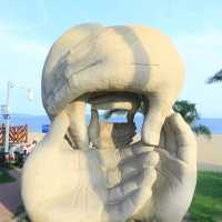 Big Hands and small hands on the beach??