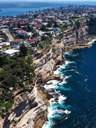 The sea breeze blends Sydney into a cup of latte