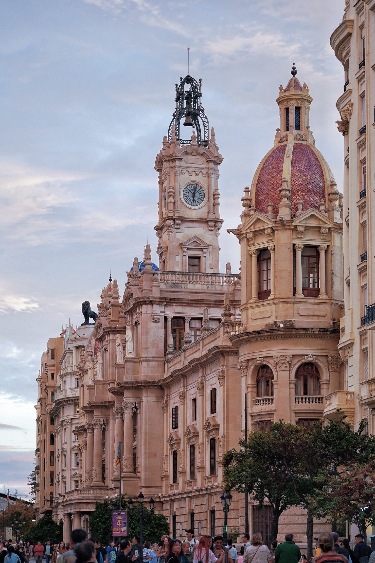 Since graduating, I’ve been trying to travel more without stressing over detailed itineraries. I spent a day in Valencia just walking around the old town to see the historical buildings. It’s about a 5km walk in total, taking around 5 hours. Here is how my day went:

09:00 - Started at Torres de Serranos. It’s an old Gothic stone gate. Entry was only 2€, and the view from the top is great.

09:50 - Wandered into Barrio del Carmen. I didn't have a map, just walked through the narrow alleys. There are some old walls and street art mixed together.

11. 00 - Reached Plaza de la Reina. The Valencia Cathedral is here. The architecture is interesting because it’s a mix of different eras. Entry was 8€.

12. 10 - Walked over to Plaza de la Virgen. The fountain and the pink-domed basilica look very peaceful together.

12. 40 - Visited the Silk Exchange (Lonja de la Seda). Tickets were 2€. The inside has these huge spiral stone columns that look like palm trees. It was definitely worth the entry fee.

13. 30 - Right across the street is the Central Market (Mercado Central). It is a beautiful modern-style building with colored glass, but it closes early at 15:00, so you have to be quick. 

14. 30 - Sat down for a late lunch and tried some local Horchata (a sweet nut milk drink), which was really refreshing after walking in the sun.

17:00 - Ended my walk at Plaza del Ayuntamiento, the main city hall square. 

If you visit, make sure to wear very flat, comfortable shoes because of the cobblestone streets. I really liked the relaxed pace of this city. I would definitely come back again.