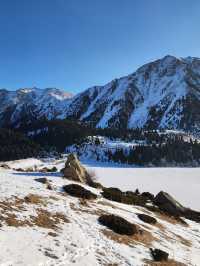 Still waters, snowy peaks, and silence