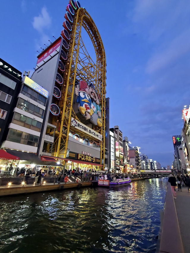 Dotonbori Street with neon light and food 