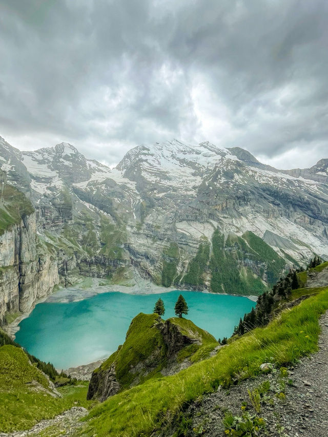 A secret Swiss lake that looks like a fantasy movie set.