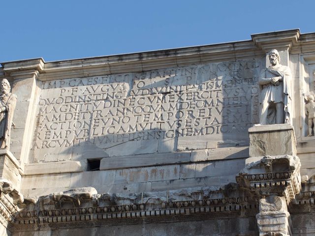 Walking in Rome by the Colosseum 