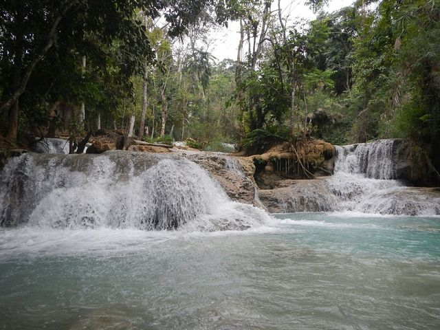 Luang Prabang's Tranquil Tapestry 🏞️🏰