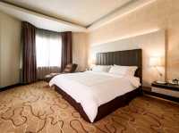 "The Promenade Hotel-Where City Convenience Meets Cozy Comfort"