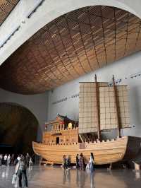 Stylish curvy Chinese museum about canal
