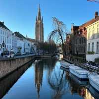 🚣♀️ Bruges: Where Canals Sparkle, Chocolate Rules & I Almost Became a Swan’s Snack 🦢
