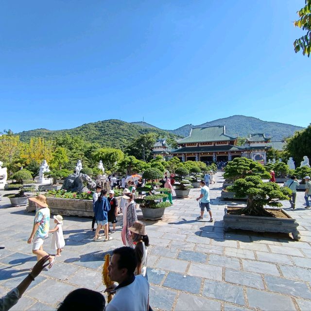 Peace and tranquility beside a giant Buddha.