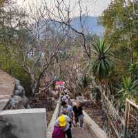 Ascending Through Time: The Legacy of Phousi Mountain