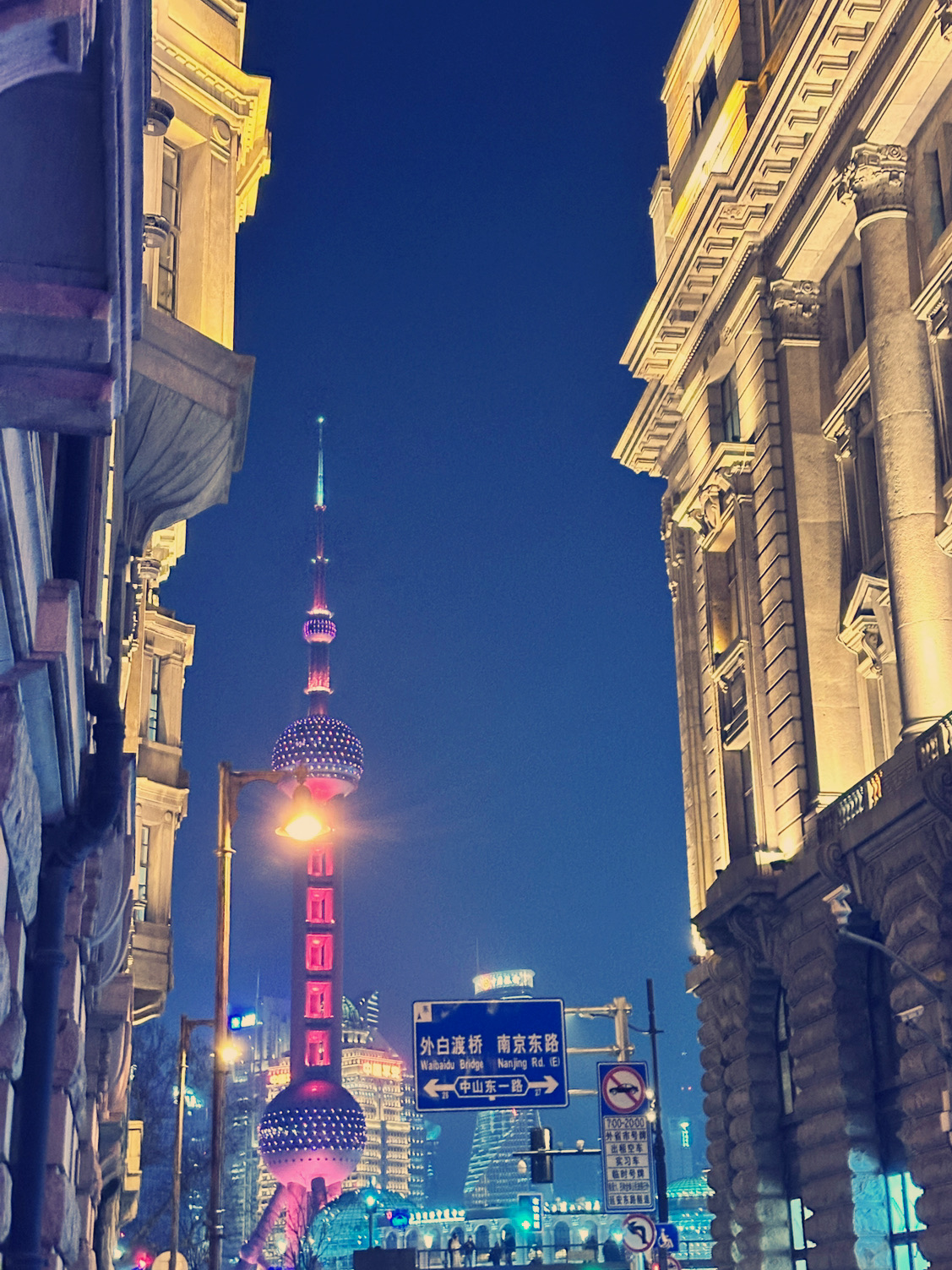 
Spring in Shanghai is like a dream woven with soft breezes and blooming flowers. Along the Huangpu River, cherry blossoms dance with the fresh green leaves of plane trees, painting the city in pastel hues. And there, piercing the sky, stands the **Oriental Pearl Tower**—its glittering spheres like diamonds strung on a thread of light, watching over countless love stories.  

🌸 Spring Blooms Beneath the Tower
At **Lujiazui Green Park**, early cherry blossoms and tulips bloom in delicate pinks and reds, their fragility contrasting with the tower’s bold steel silhouette. As the sun sets, golden light bathes the Pearl Tower, and couples stroll hand in hand along the Bund, sealing this moment in memory.  

### 🌃 **A Night of Neon and Whispers**  
When night falls, the Oriental Pearl Tower ignites the sky with its dazzling light show. The **glass-bottomed observation deck** at 267 meters becomes the ultimate test—and reward—for lovers. Standing above the sparkling city, with all of Shanghai stretched beneath your feet, even the spring wind carries traces of sweet promises.  

### 🍃 **A Silent Dialogue Across the River**  
From the historic **Bund**, the Pearl Tower peers through the spring mist, its reflection shimmering on the Huangpu River. Ferries glide by, weaving ripples into the water, as if time itself slows down. Here, old Shanghai’s charm and the city’s futuristic skyline merge into poetry.  

**"In the arc of falling cherry petals, I see the Oriental Pearl Tower smile."**  
This spring, come to Shanghai—let the Pearl Tower be the witness to your romance.  
#springitinerary 