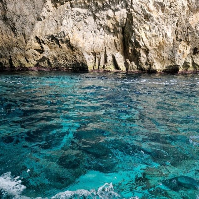 Serene Seascapes: Blue Grotto Boat Adventure in Malta 🌊✨