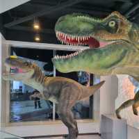 High tech hotel check-in with Robots and Dino