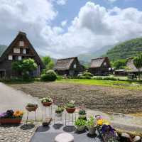 A Fairytale Village Surrounded by Snowy Peaks