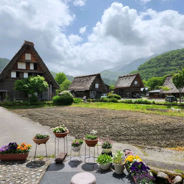 A Fairytale Village Surrounded by Snowy Peaks