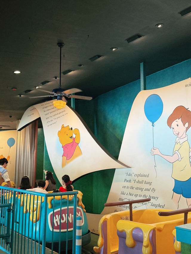 นั่งเครื่องเล่น Winnie the pooh