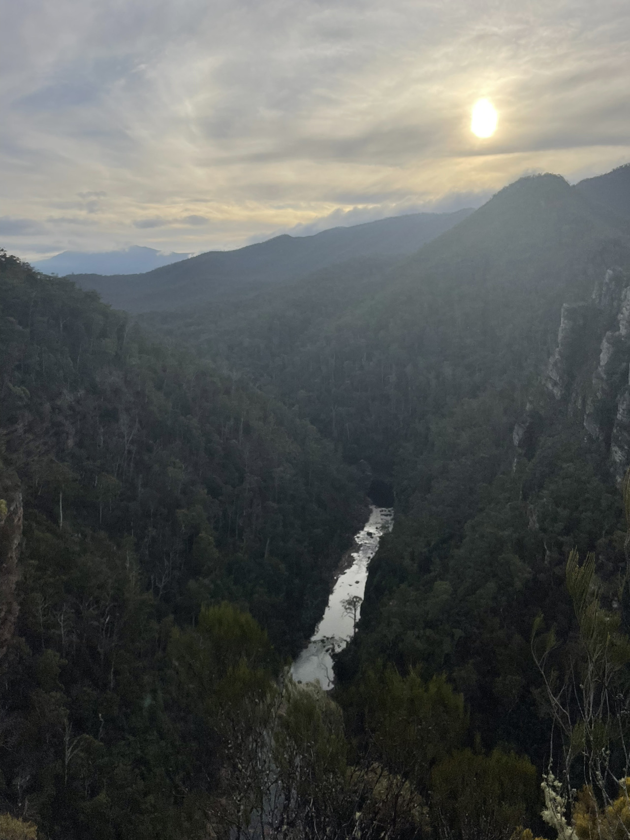 Australia | Tasmania ￼Standing on a Cliff Overlooking a Magnificent Million-Year-Old Gorge.
