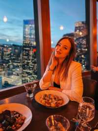 Dinner with a view... that moves. 🌆🍷