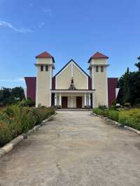 Seminari Sinar Buana: A Bright Yellow Church with a Serene Garden