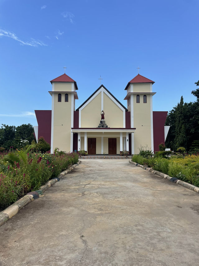 Seminari Sinar Buana: A Bright Yellow Church with a Serene Garden