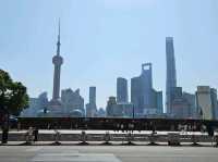 Taking a nice day time stroll across The Bund at Shanghai