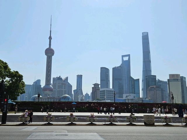 Taking a nice day time stroll across The Bund at Shanghai