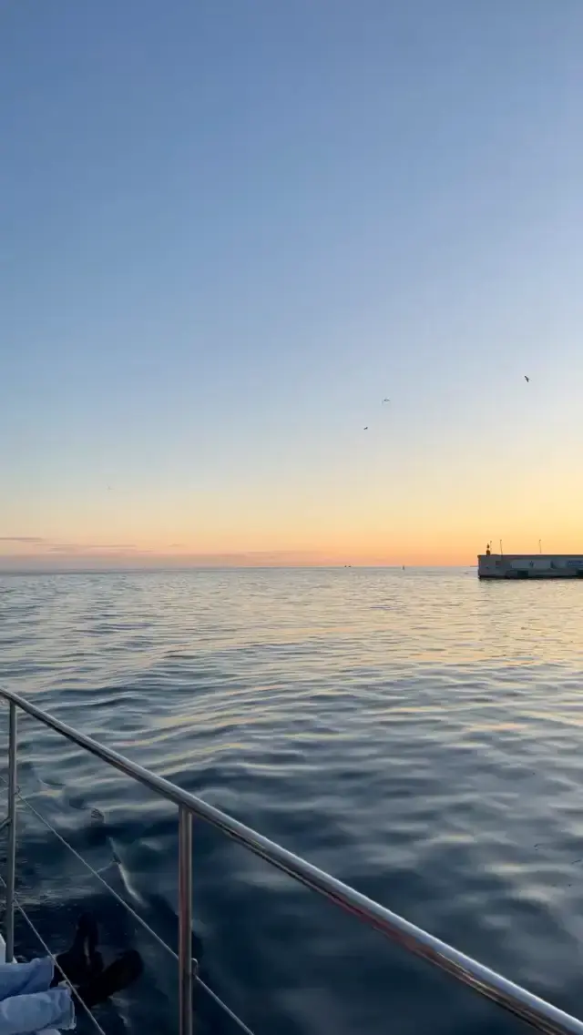 Sunset over the waves of Malaga 