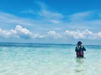 At the meeting of sea and sky, find the purest peace.