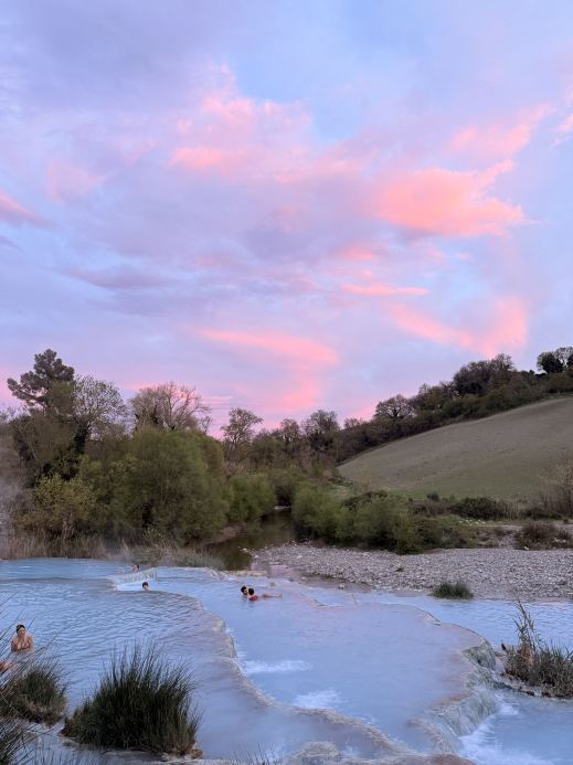 The time when the sunset in Tuscany, Italy melts into the water.