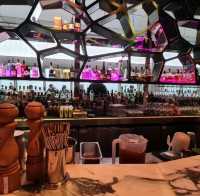 Sipping a drink at the top of Victoria Harbour