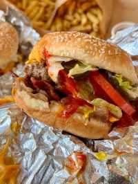 The only thing better than the view? These juicy burgers. 🍔💯 #FiveGuysGenting