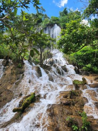 Take a stroll at the crystal-clear Tararak Waterfall