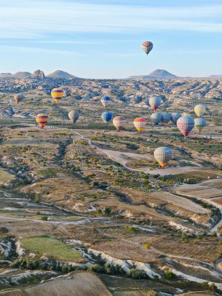 Romantic Turkey - Take a hot air balloon to see the sunrise over the valley. 