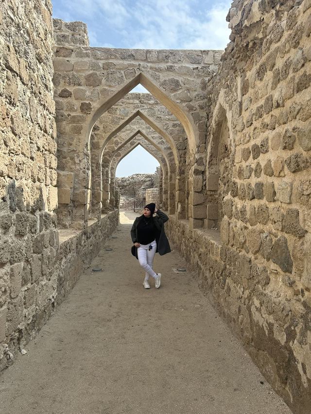 “Whispers of the Past: The Timeless Walls of Bahrain Fort”