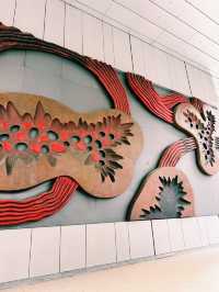 Sculpted Stories at OUE Bayfront: A Lobby of Contemplation and Courage