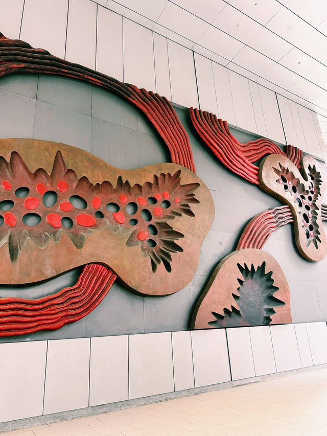 Sculpted Stories at OUE Bayfront: A Lobby of Contemplation and Courage