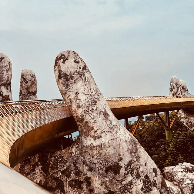🌉✨ *Golden Bridge (Cầu Vàng): Vietnam’s Giant Hands Holding a Gilded Pathway* 🏞️🌿