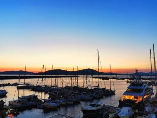 Alghero - Sunset Between the Boats