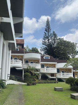 Weekend escape in Tagaytay? Estancia Resort Hotel is your chill base for exploring the city’s best views 🌋✨ The hotel sits right on Tagaytay-Calamba Road, putting you super close to the big attractions—so you spend less time in traffic and more time soaking in those Taal Lake sights.

TOP REASONS TO STAY AT ESTANCIA:
· Spacious rooms (perfect for families or barkada!)—slightly old-school but clean and comfy.
· Freebies alert: Complimentary billiards, table tennis, parking, and a pool & jacuzzi for a fun, fuss-free stay.
· Solid breakfast included, so you can power up before heading out to skyranch or bulalo joints.
· Nearby must-sees: Picnic Grove (for zipline, horseback rides), People’s Park in the Sky for panoramic pics, and the famous Mahogany Market (don’t miss the bulalo!).
· Super friendly staff; just a heads-up, some facilities might feel dated, and the rooms are a walk from the reception—so pack light!

EXTRA TRAVELER TIPS:
· Enjoy the pool and jacuzzi early to beat any crowds (it’s open 8am–8pm).
· Free parking means you don’t have to stress about your car or extra fees.
· If you’re after billiards/table tennis, ask reception as soon as you check in—those freebies are popular!
· The breakfast gets you fueled but keep snacks on hand for in-between adventures.

GETTING AROUND:
Tricycle rides are easy for short hops, but a private car is best for flexibility (that free parking is golden!). Weather can shift from sunny to chilly fast, so pack a jacket.

#TagaytayViews  #StaycationPH  #EstanciaResort  #TaalLake  #TravelWithTripdotcom #travel2026 