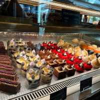 spacious cace with pastries and coffee