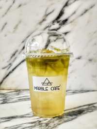 Sip elegance. Every cup at Marble Café i