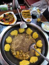 Trying out Beijing Tie Guo Dun Dish