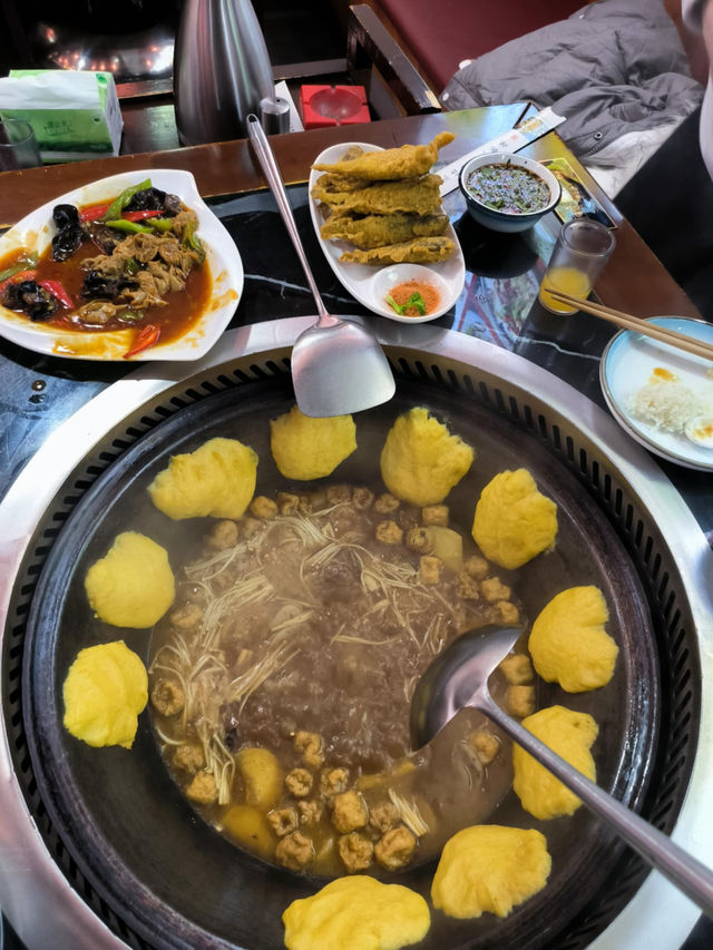 Trying out Beijing Tie Guo Dun Dish