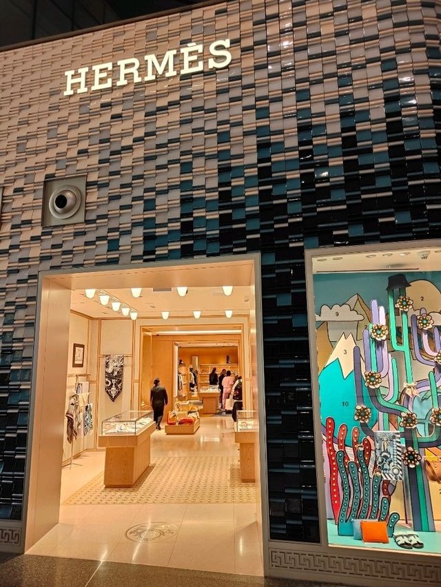 “A Transit of Silk and Gold: Luxury Shopping at Hamad International Airport”