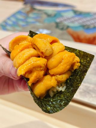 This is the only place that offers such a gorgeous three-layered sea urchin hand roll perfect for spring!