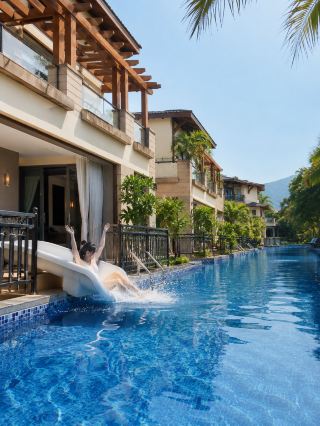This is a treasure trove of a resort hotel where you can slide right into the pool right outside your door.